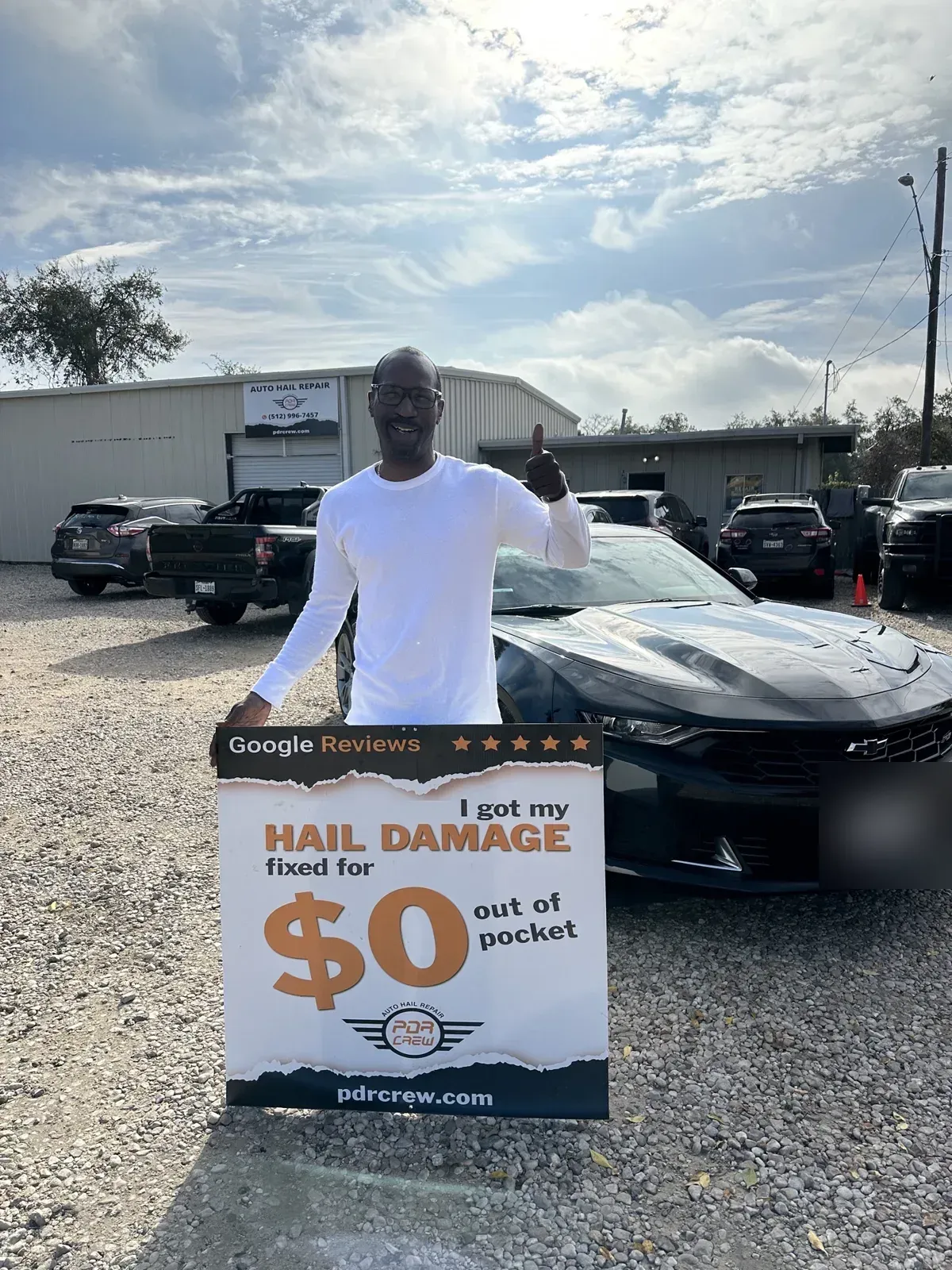 PDR Crew customer with his Camaro after hail repair