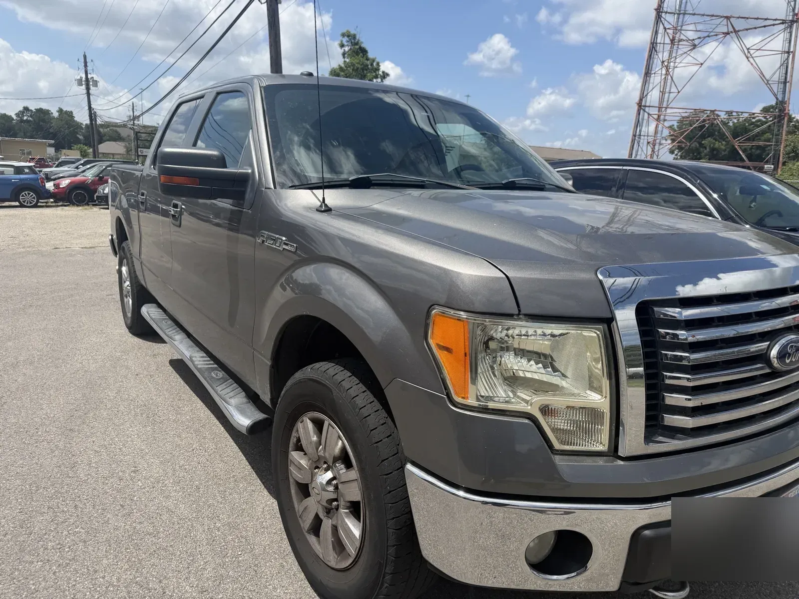 Gray Ford F-150 outside the shop