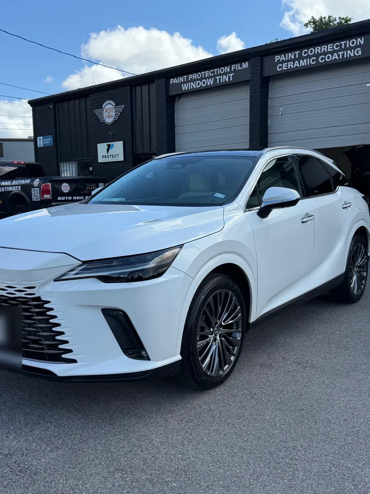 White Lexus RX outside the PDR Crew shop