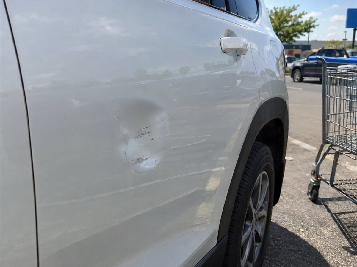 Door ding before repair