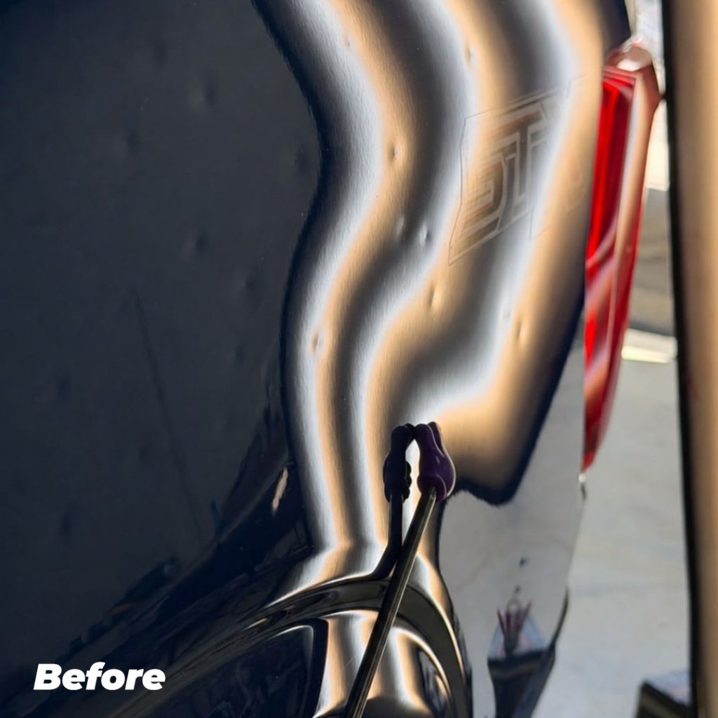Hail dent before repair
